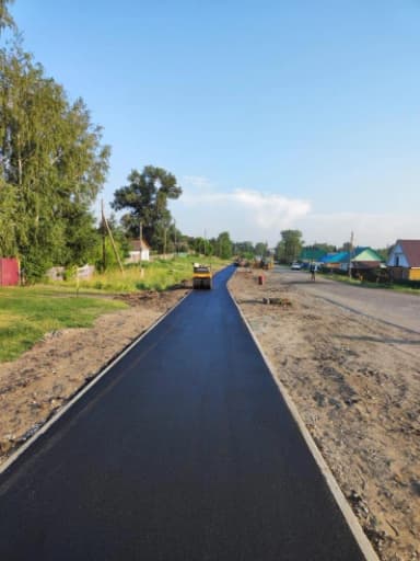 Завершение укладки асфальта, уплотнение покрытия