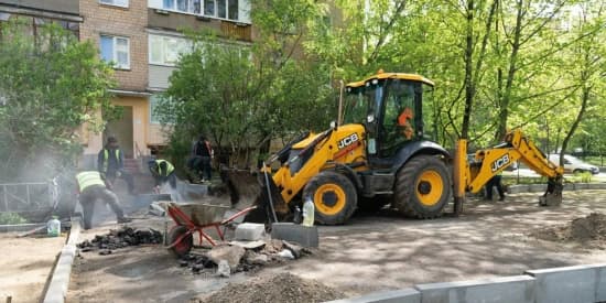 Выравнивание участка с использованием спецтехники